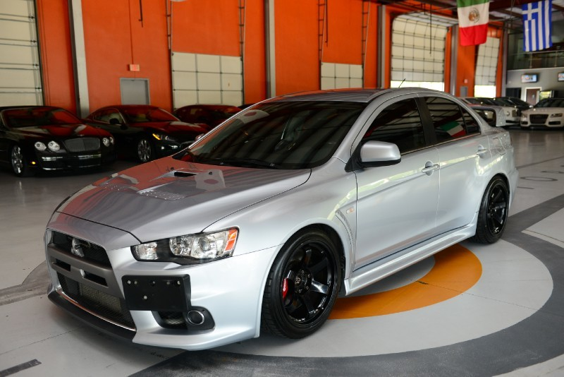 Illustration for article titled Why Buy A Honda Civic When The Best Lancer Evolution Ever Made Costs Way Less?Â